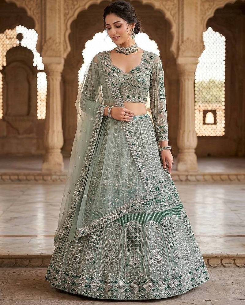 GREEN SOFT NET  EMBROIDERY SEMI STICHED  LEHENGA WHIT BLOUSE
