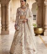 CREAM SOFT NET  EMBROIDERY SEMI STICHED  LEHENGA WHIT BLOUSE