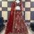 MAROON SOFT NET  EMBROIDERY SEMI STICHED  LEHENGA WHIT BLOUSE