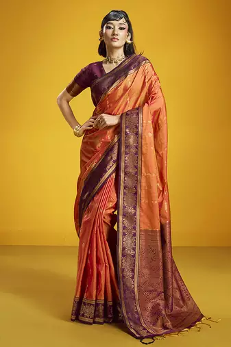 Orange handloom silk blend saree with weaving work