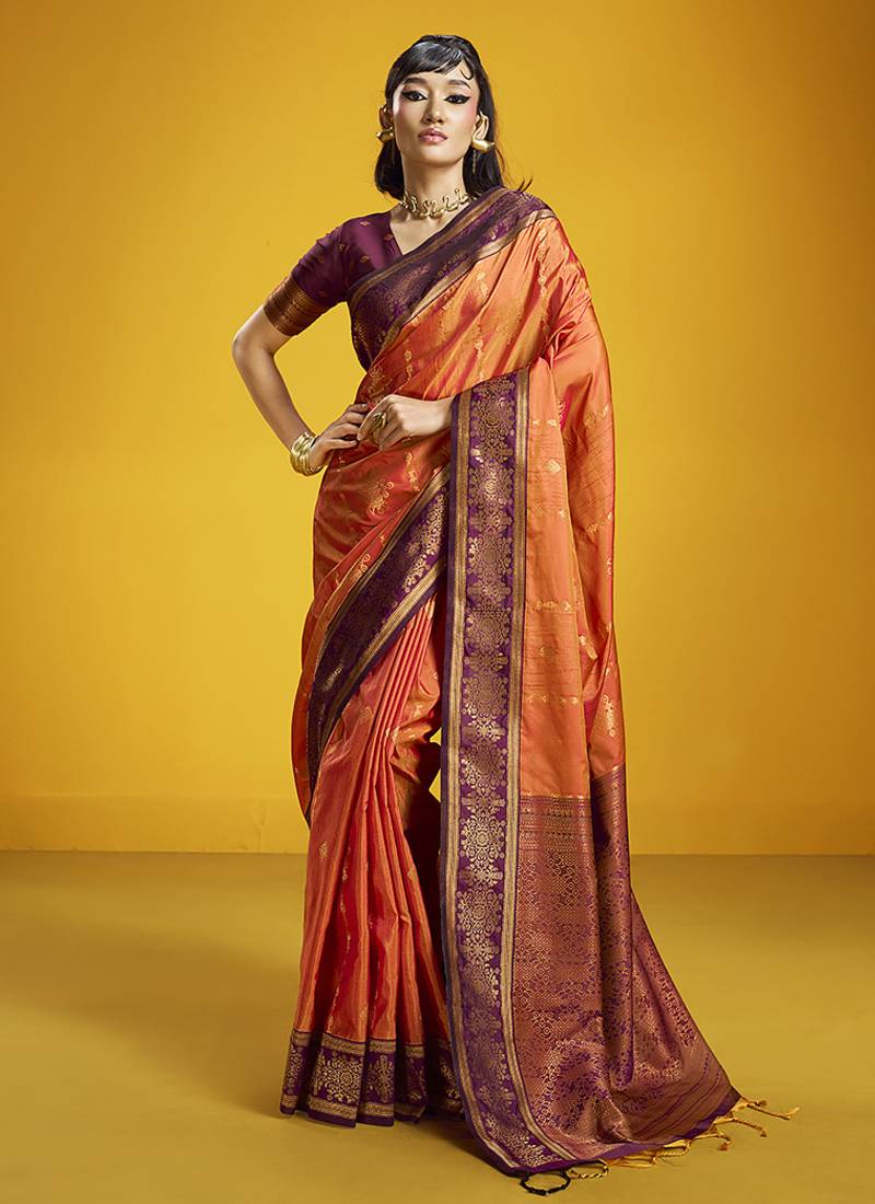 Orange handloom silk blend saree with weaving work