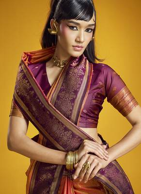 Orange handloom silk blend saree with weaving work 2