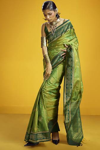 Green handloom silk blend saree with weaving work