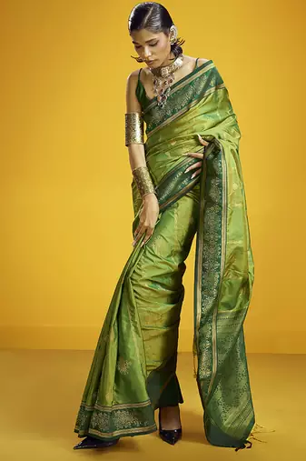 Green handloom silk blend saree with weaving work