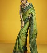 Green handloom silk blend saree with weaving work