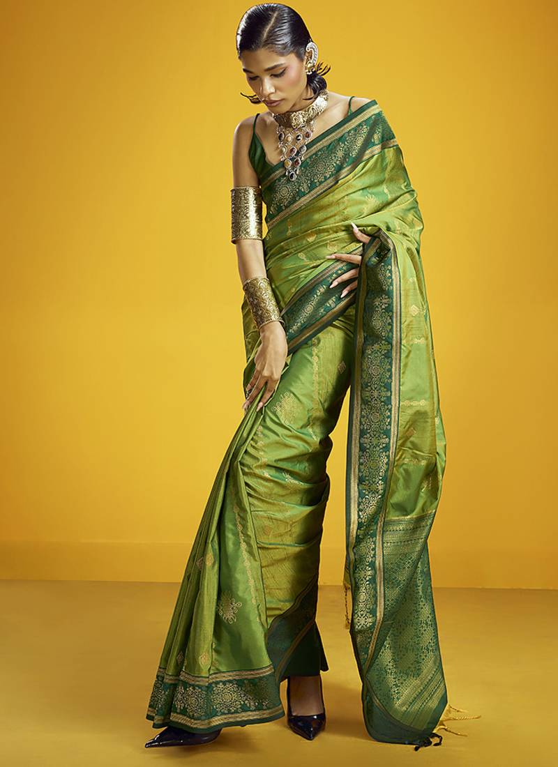 Green handloom silk blend saree with weaving work