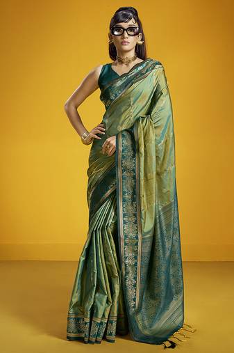 Green handloom silk blend saree with weaving work