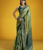 Green handloom silk blend saree with weaving work