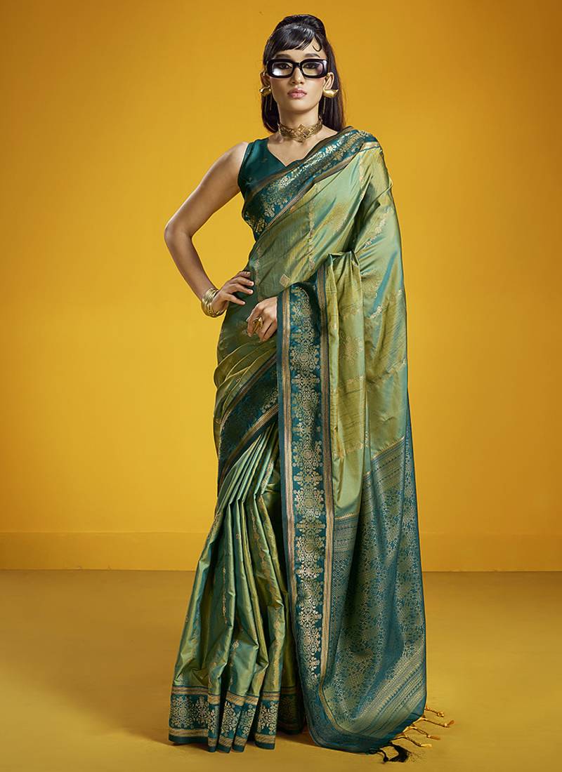 Green handloom silk blend saree with weaving work
