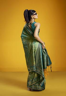 Green handloom silk blend saree with weaving work 2