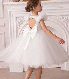 White embellished net party wear fit & flare girls dress
