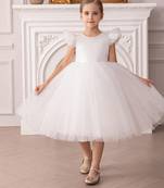 White embellished net party wear fit & flare girls dress