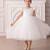 White embellished net party wear fit & flare girls dress