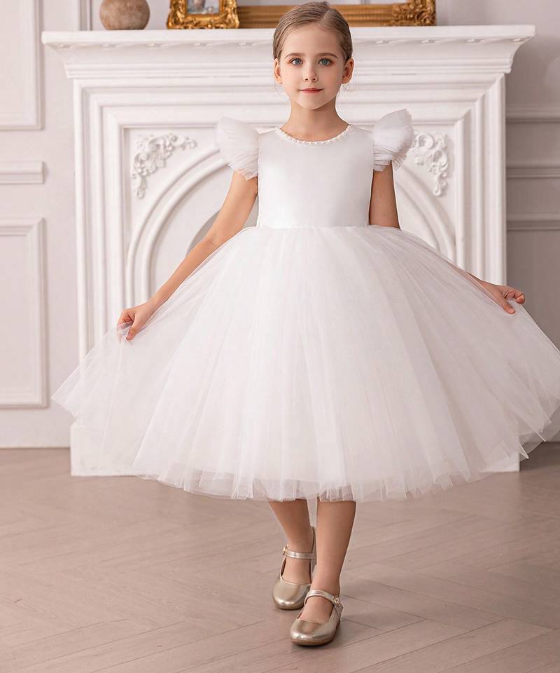 White embellished net party wear fit & flare girls dress