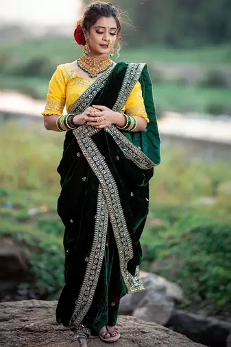 Green bloue piece with embroidred velvet saree