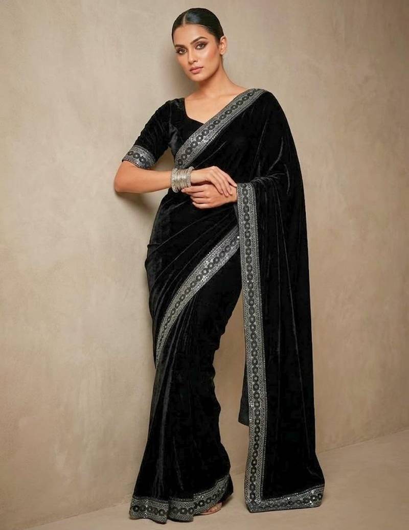 Black bloue piece with embroidred velvet saree