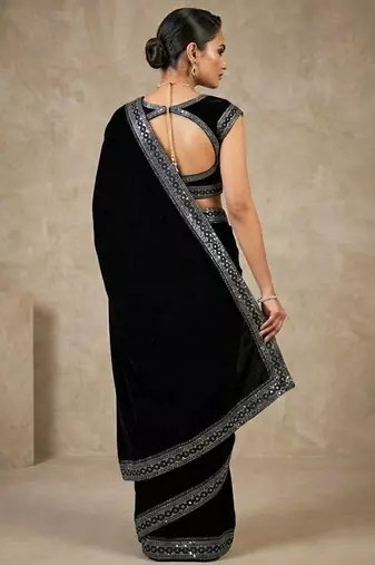 Black bloue piece with embroidred velvet saree