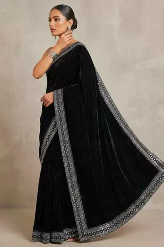 Black bloue piece with embroidred velvet saree