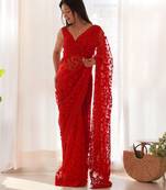 Red embroidered blouse with embroidered saree