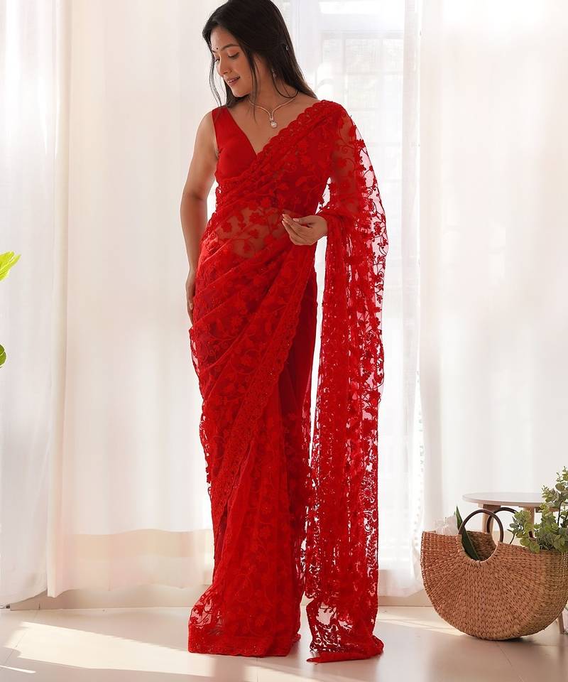 Red embroidered blouse with embroidered saree