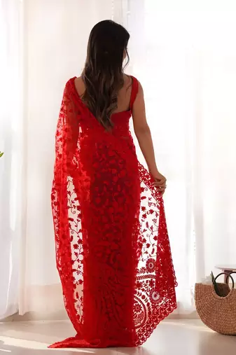 Red embroidered blouse with embroidered saree