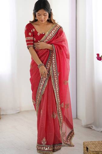 Red embroidered blouse with embroidered saree
