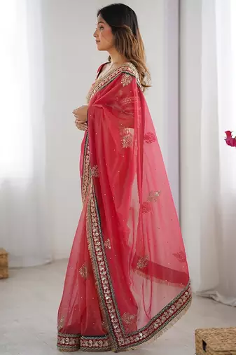 Red embroidered blouse with embroidered saree