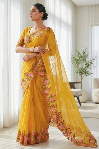 Yellow embroidered blouse with embroidered saree