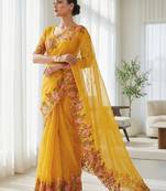 Yellow embroidered blouse with embroidered saree