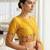 Yellow embroidered blouse with embroidered saree