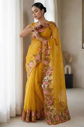 Yellow embroidered blouse with embroidered saree