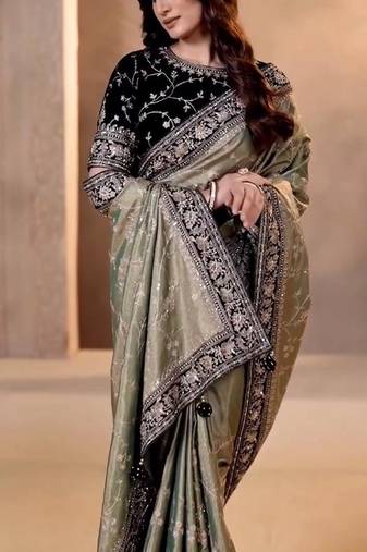 Green embroidered blouse with embroidered saree