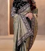 Green embroidered blouse with embroidered saree