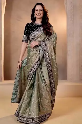 Green embroidered blouse with embroidered saree