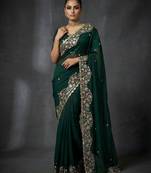 Green embellished saree with embellished blouse