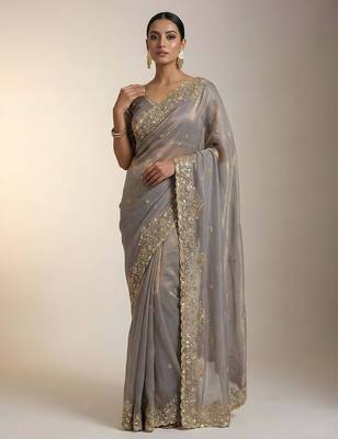 Beige embellished saree with embellished blouse 1