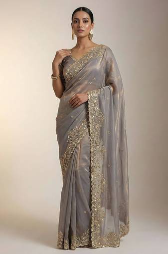 Beige embellished saree with embellished blouse