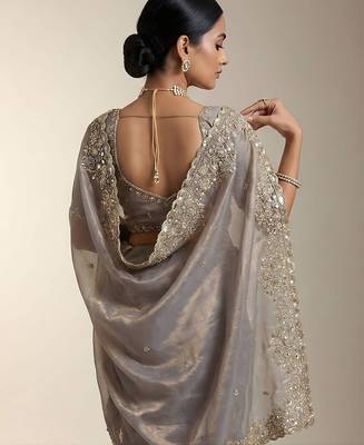 Beige embellished saree with embellished blouse 5