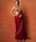 Red embroidered blouse with embroidered saree