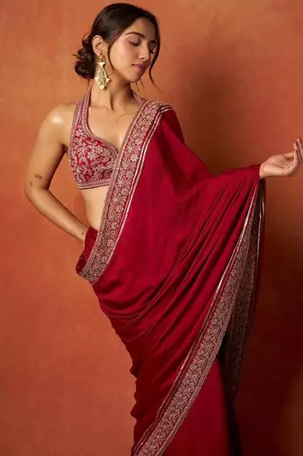 Red embroidered blouse with embroidered saree