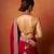 Red embroidered blouse with embroidered saree