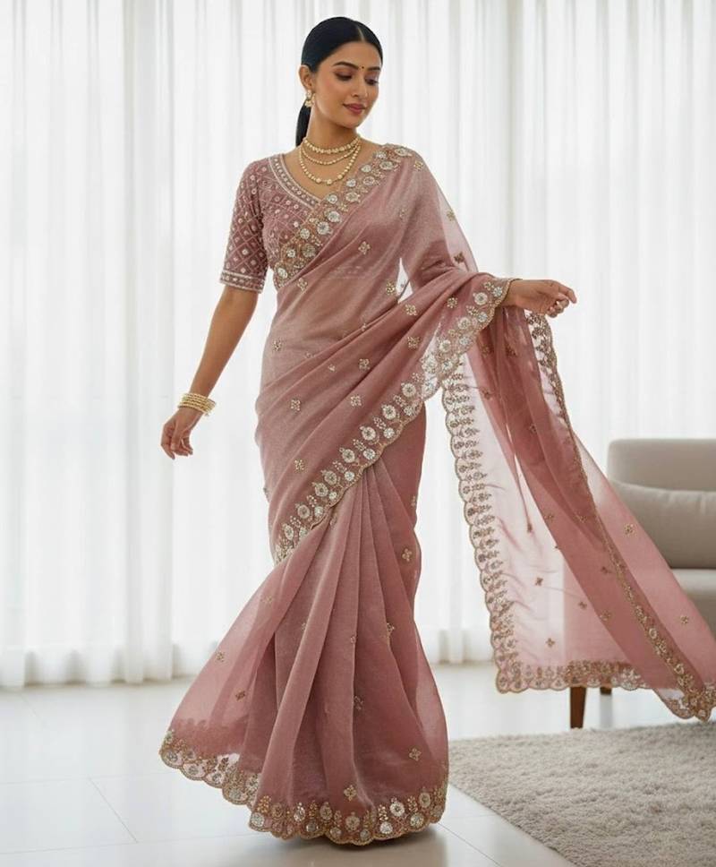 Pink embellished saree with embellished blouse
