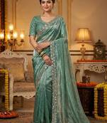 Green embellished saree with embellished blouse
