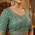 Green embellished saree with embellished blouse