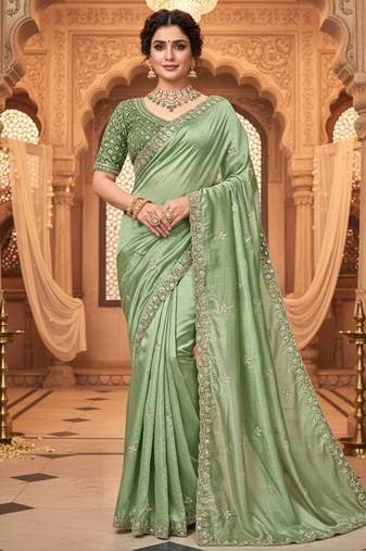 Mint green embellished saree with embellished blouse