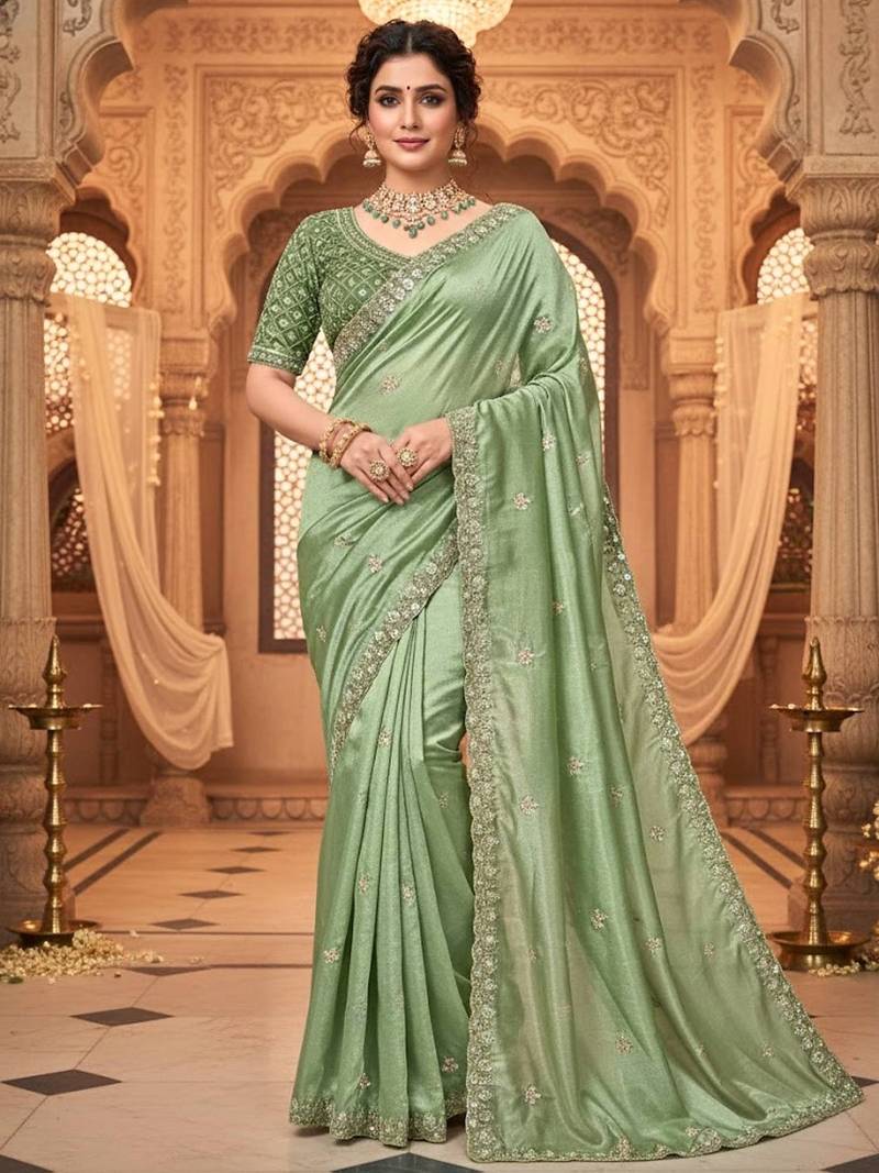 Mint green embellished saree with embellished blouse