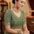 Mint green embellished saree with embellished blouse