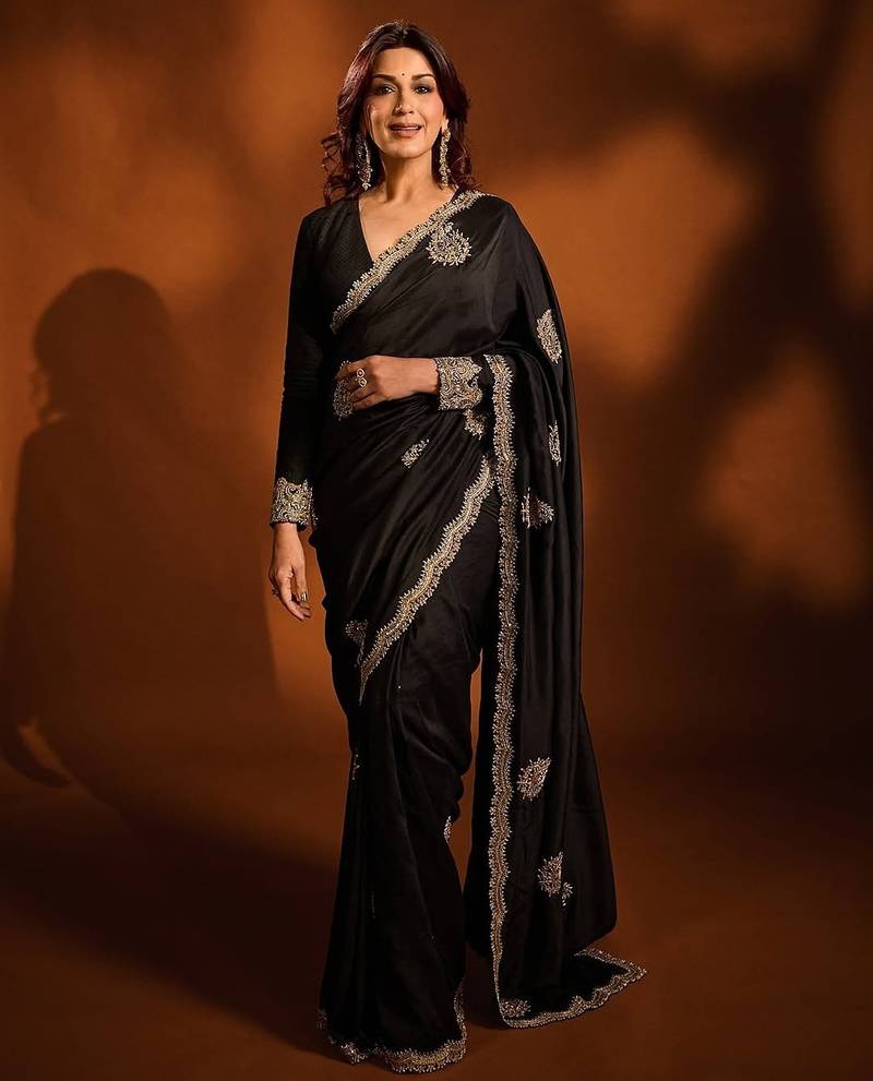 Black embroidered blouse with embroidered saree