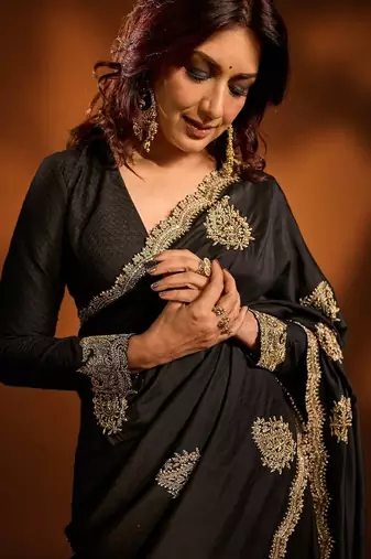 Black embroidered blouse with embroidered saree