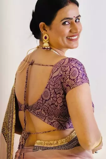 Purple embroidered blouse with embroidered saree